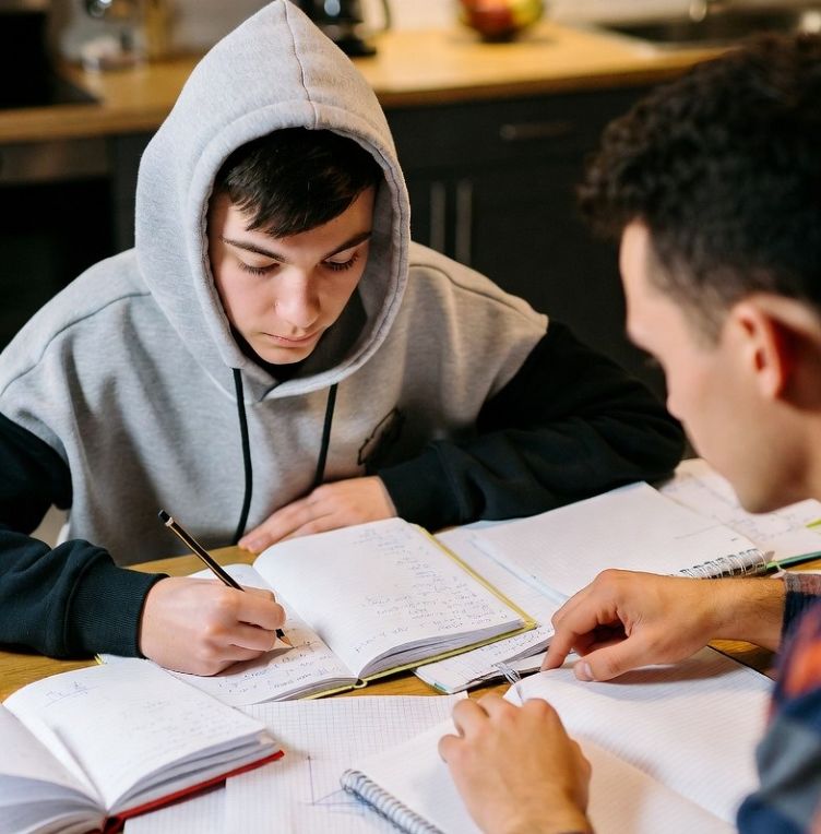 student solving algebra problems with a tutor